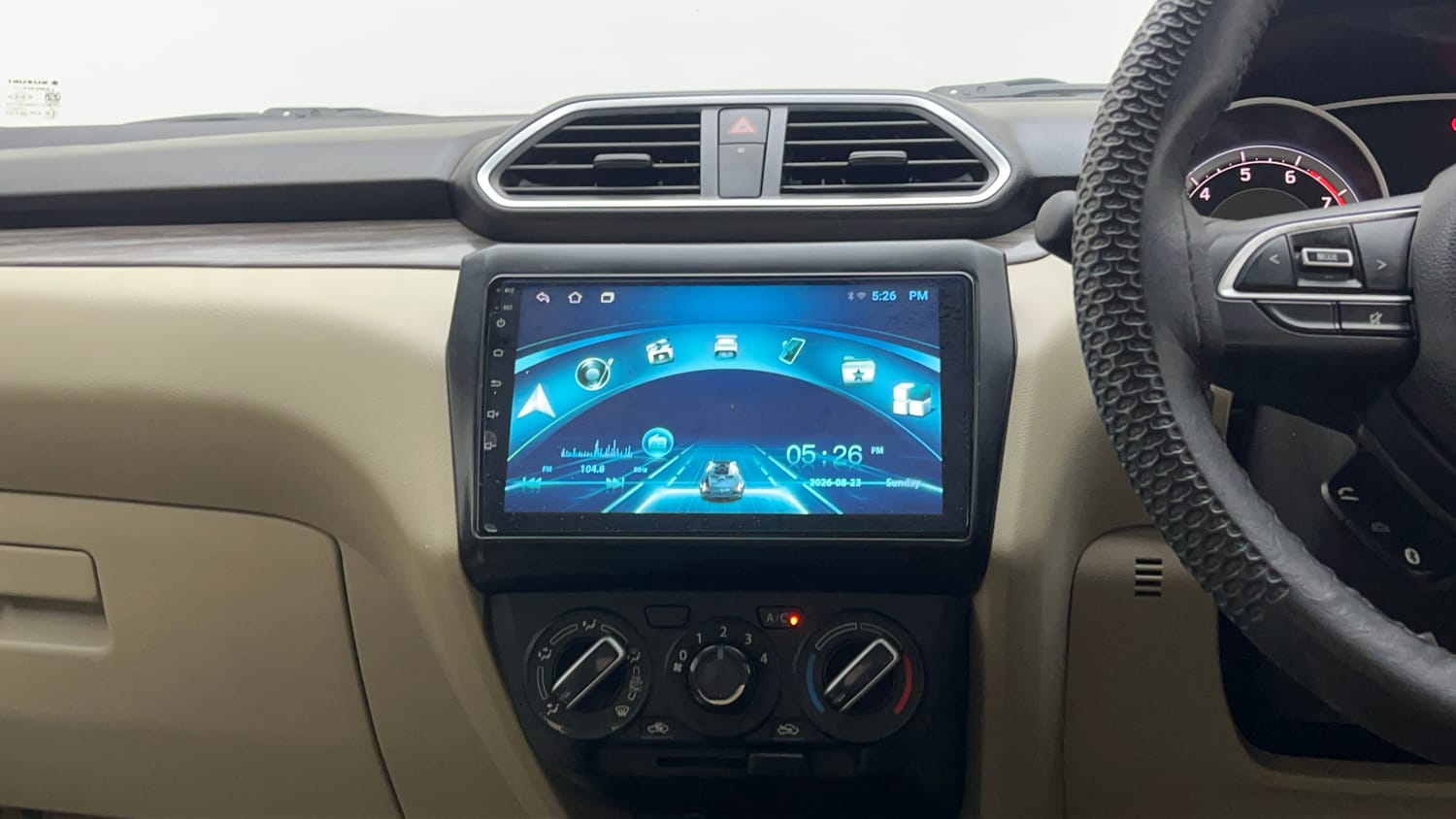 Used 2022 Maruti Suzuki Dzire VXi Petrol Manual top_features Integrated (in-dash) music system