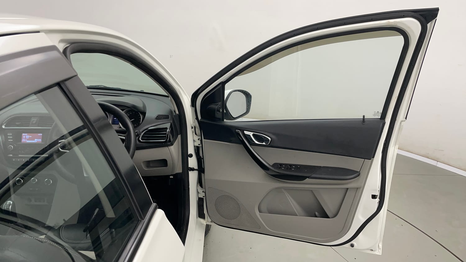 Used 2016 Tata Tiago Revotron XZ Petrol Manual interior RIGHT FRONT DOOR OPEN VIEW