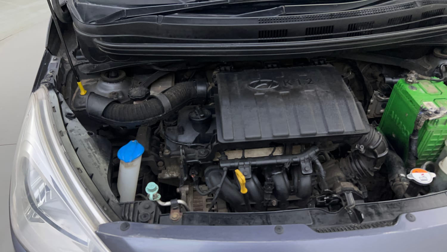 Used 2014 Hyundai Grand i10 Sportz 1.2 Kappa VTVT Petrol Manual engine ENGINE RIGHT SIDE HINGE & APRON VIEW