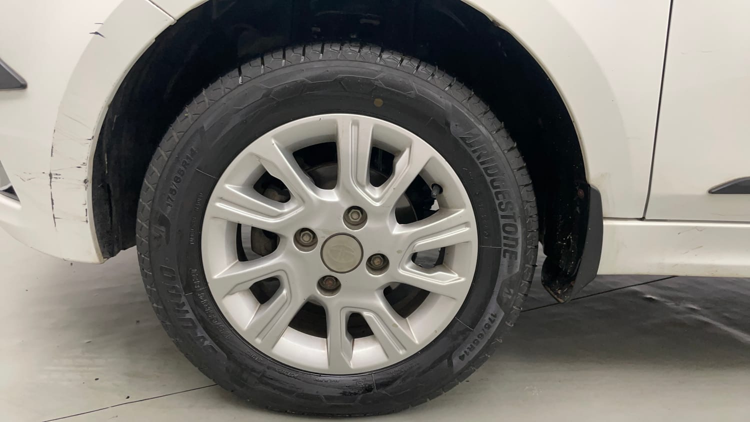 Used 2016 Tata Tiago Revotron XZ Petrol Manual tyres LEFT FRONT TYRE RIM VIEW