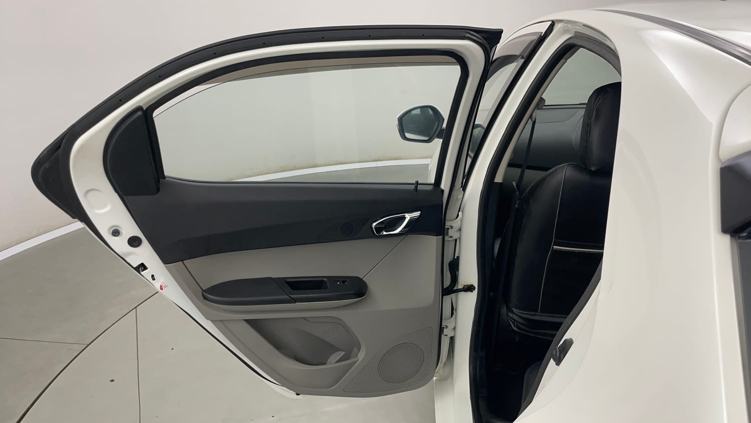 Used 2016 Tata Tiago Revotron XZ Petrol Manual interior LEFT REAR DOOR OPEN VIEW