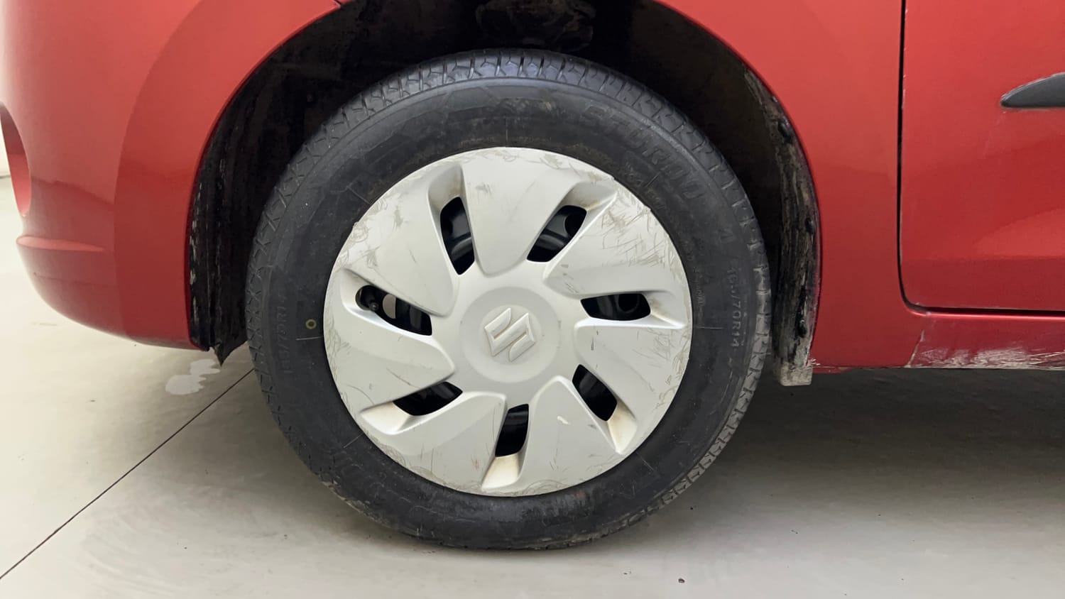 Used 2015 Maruti Suzuki Celerio VXi AMT Petrol Automatic tyres LEFT FRONT TYRE RIM VIEW