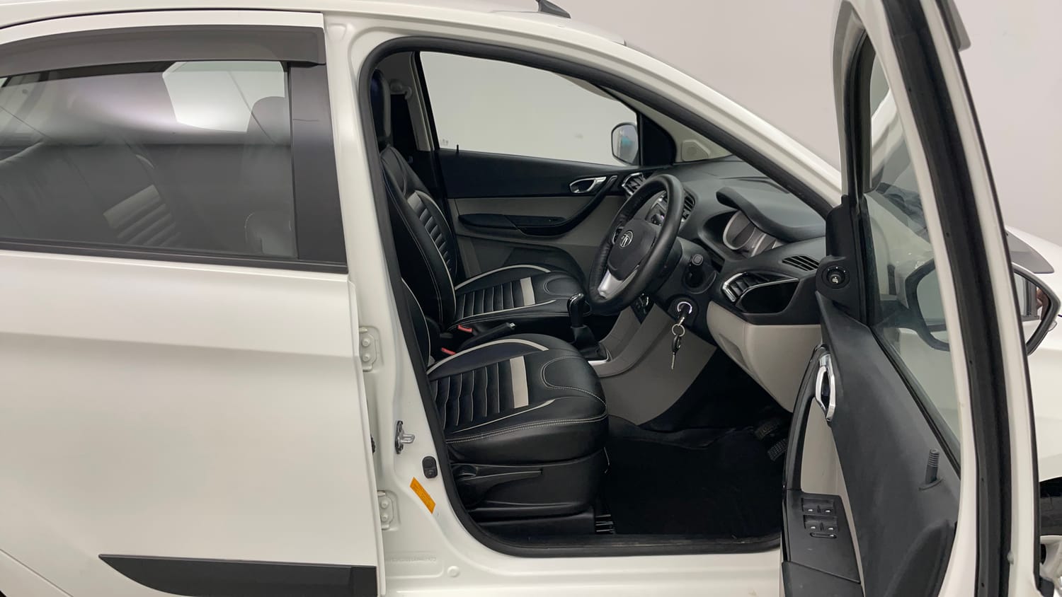 Used 2016 Tata Tiago Revotron XZ Petrol Manual interior RIGHT SIDE FRONT DOOR CABIN VIEW