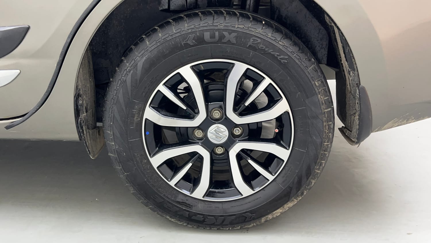 Used 2022 Maruti Suzuki Dzire VXi Petrol Manual tyres LEFT REAR TYRE RIM VIEW