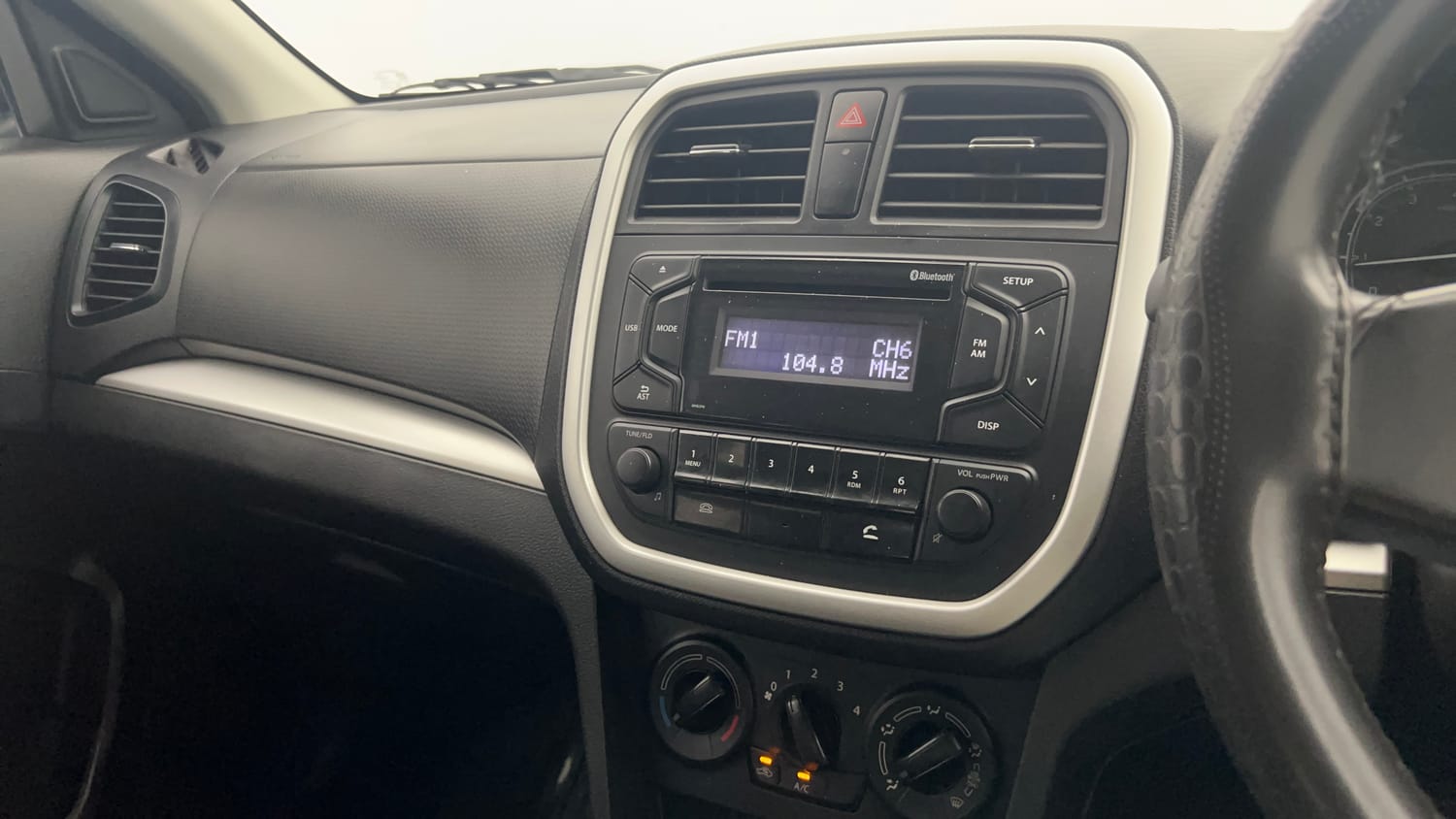 Used 2022 maruti-suzuki Vitara Brezza LXi Petrol Manual interior MUSIC SYSTEM & AC CONTROL VIEW