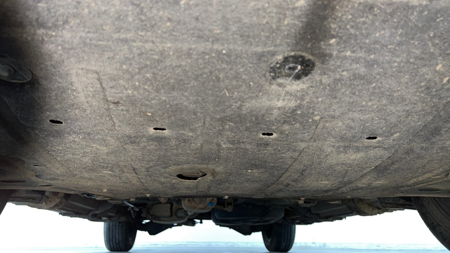 Used 2024 Mahindra XUV700 AX 7 Luxury Pack Diesel MT 7 STR Diesel Manual extra FRONT LEFT UNDERBODY VIEW