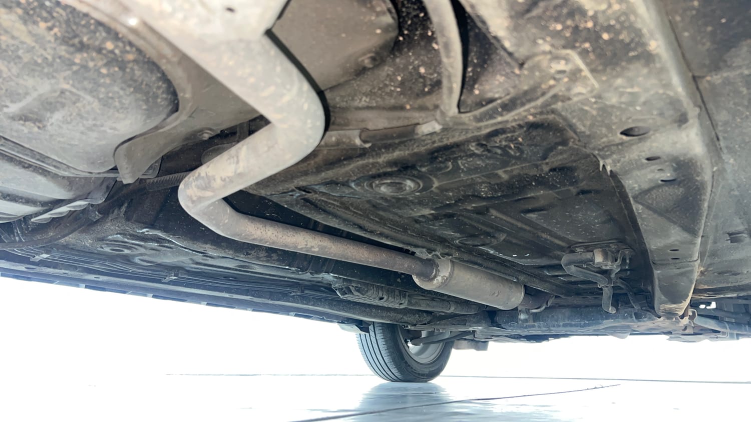 Used 2022 Maruti Suzuki XL6 Alpha Plus MT Petrol Petrol Manual extra REAR RIGHT UNDERBODY VIEW