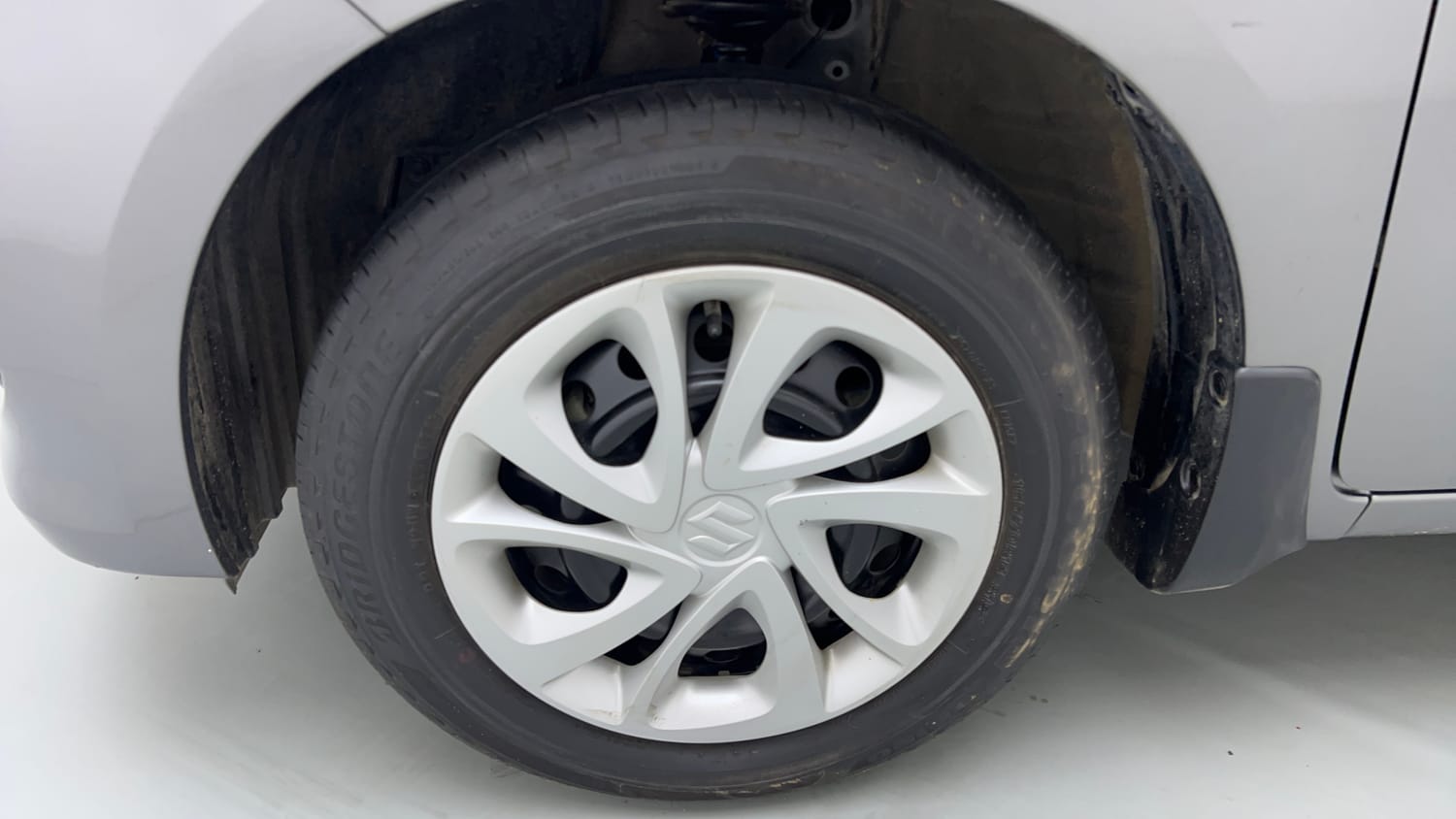 Used 2022 Maruti Suzuki Celerio VXi Petrol Manual tyres LEFT FRONT TYRE RIM VIEW