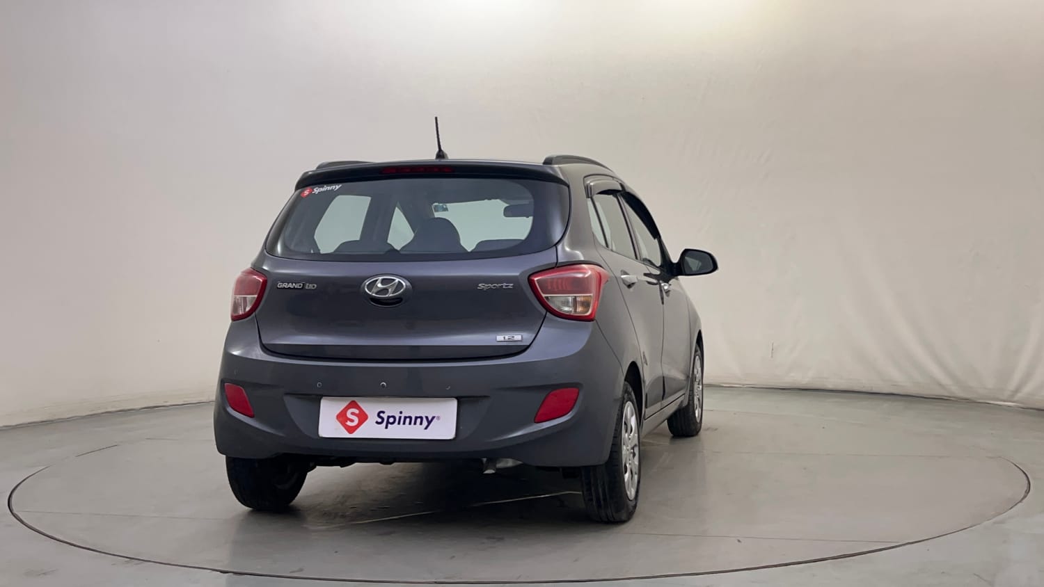 Used 2014 Hyundai Grand i10 Sportz 1.2 Kappa VTVT Petrol Manual exterior RIGHT REAR CORNER VIEW