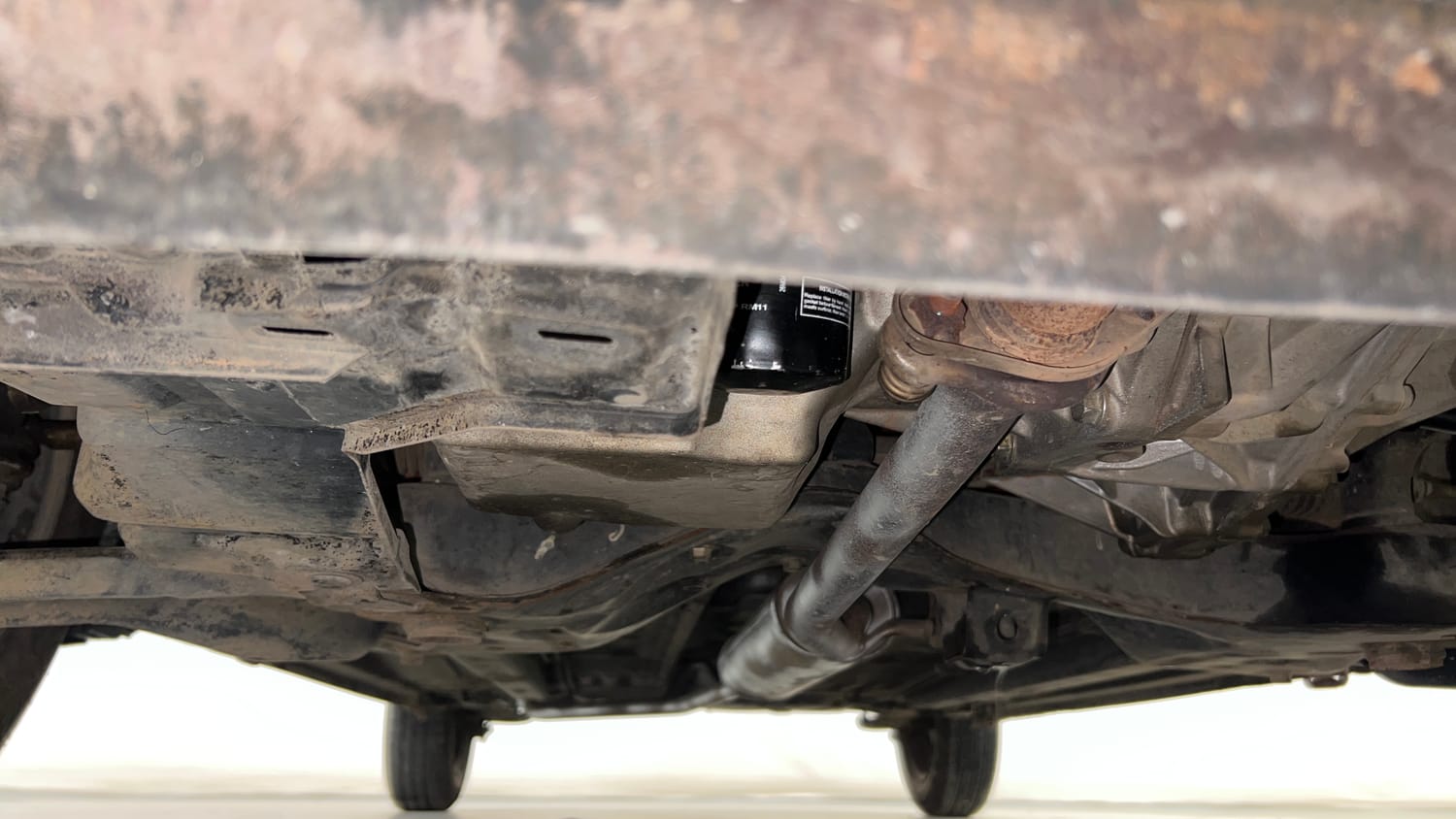 Used 2015 Maruti Suzuki Celerio VXi AMT Petrol Automatic extra FRONT LEFT UNDERBODY VIEW