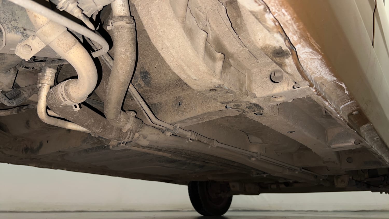Used 2015 Tata Nano Twist XTA Petrol Automatic extra REAR RIGHT UNDERBODY VIEW