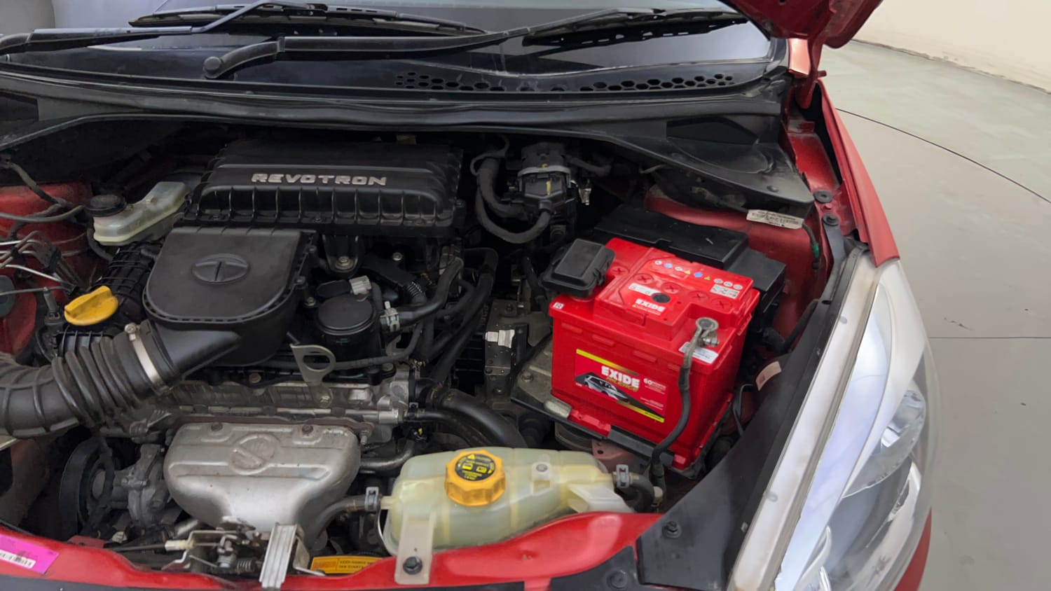 Used 2017 Tata Tiago Revotron XZA Petrol Automatic engine ENGINE LEFT SIDE HINGE & APRON VIEW