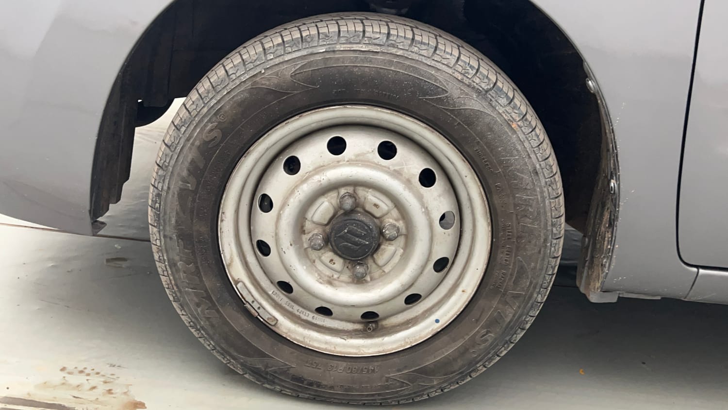 Used 2013 Maruti Suzuki Wagon R LXI Petrol Manual tyres LEFT FRONT TYRE RIM VIEW