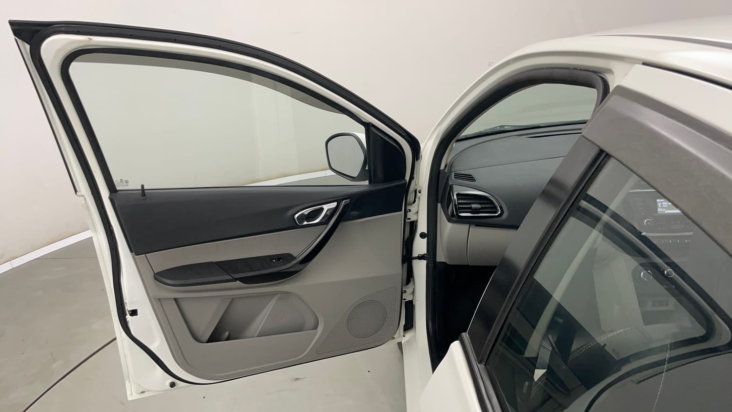 Used 2016 Tata Tiago Revotron XZ Petrol Manual interior LEFT FRONT DOOR OPEN VIEW