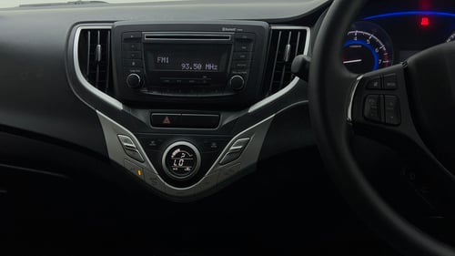 Used 2017 Maruti Suzuki Baleno Delta 1.2 Petrol Manual interior MUSIC SYSTEM & AC CONTROL VIEW