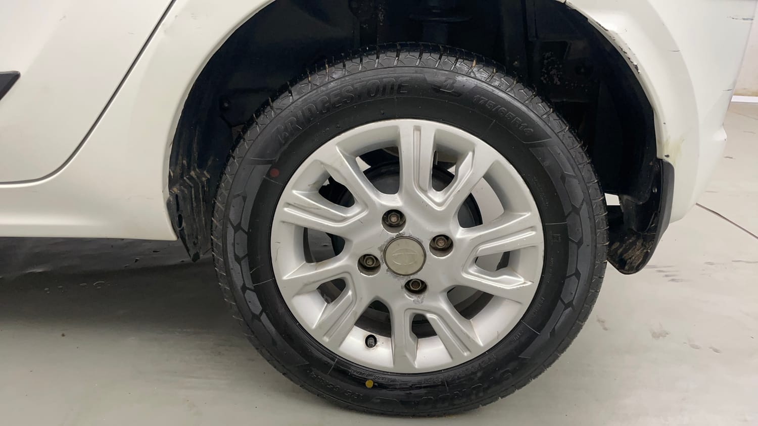 Used 2016 Tata Tiago Revotron XZ Petrol Manual tyres LEFT REAR TYRE RIM VIEW
