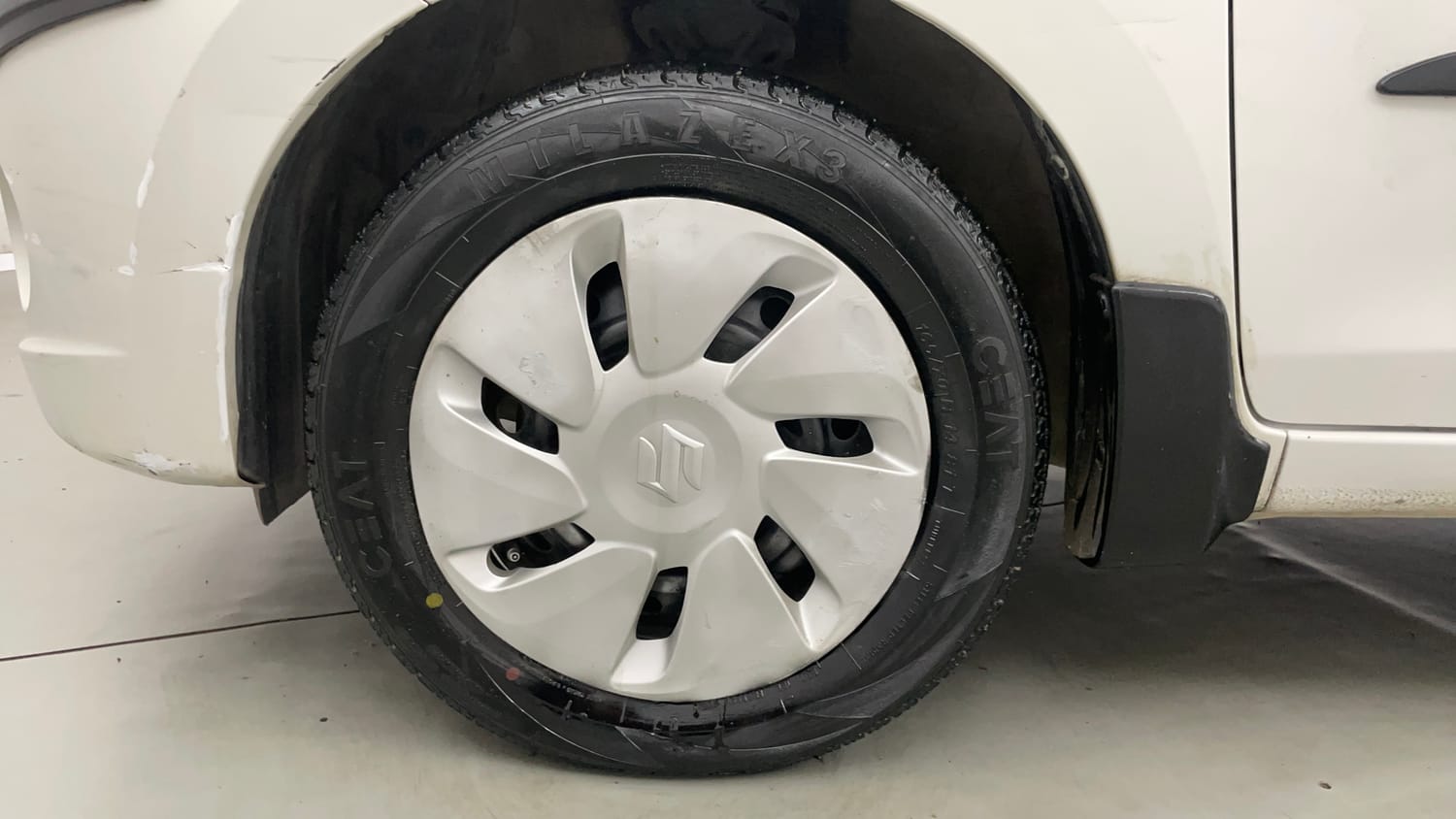 Used 2016 Maruti Suzuki Celerio VXi Petrol Manual tyres LEFT FRONT TYRE RIM VIEW