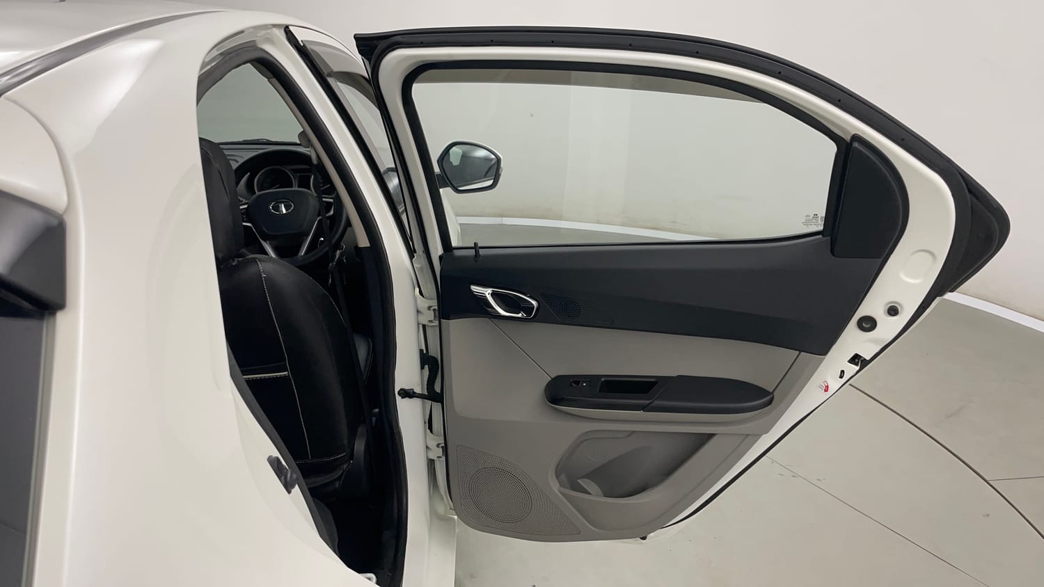 Used 2016 Tata Tiago Revotron XZ Petrol Manual interior RIGHT REAR DOOR OPEN VIEW