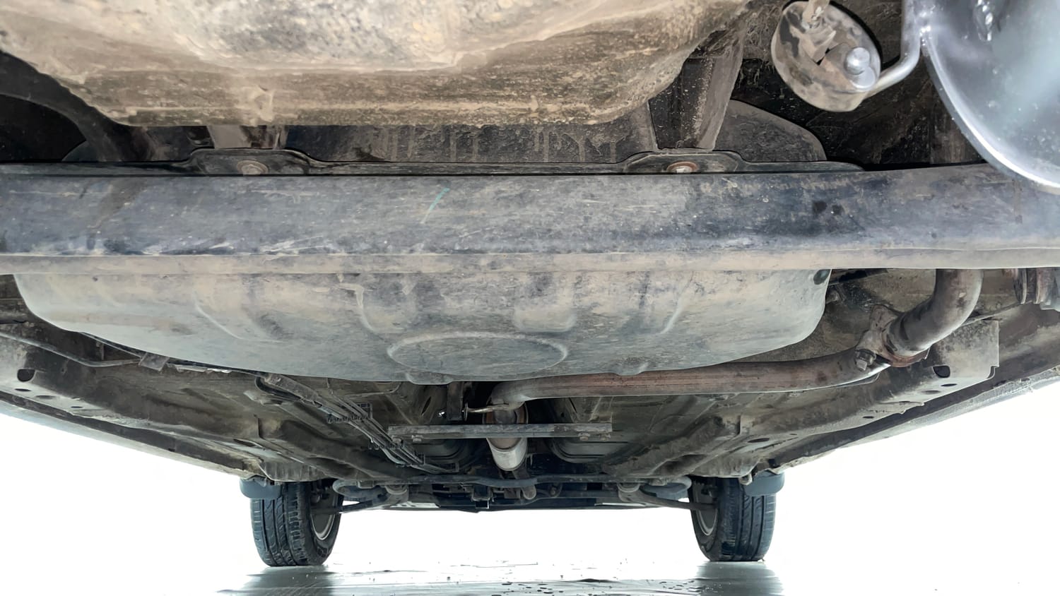 Used 2016 Tata Tiago Revotron XZ Petrol Manual extra REAR UNDERBODY VIEW (TAKEN FROM REAR)
