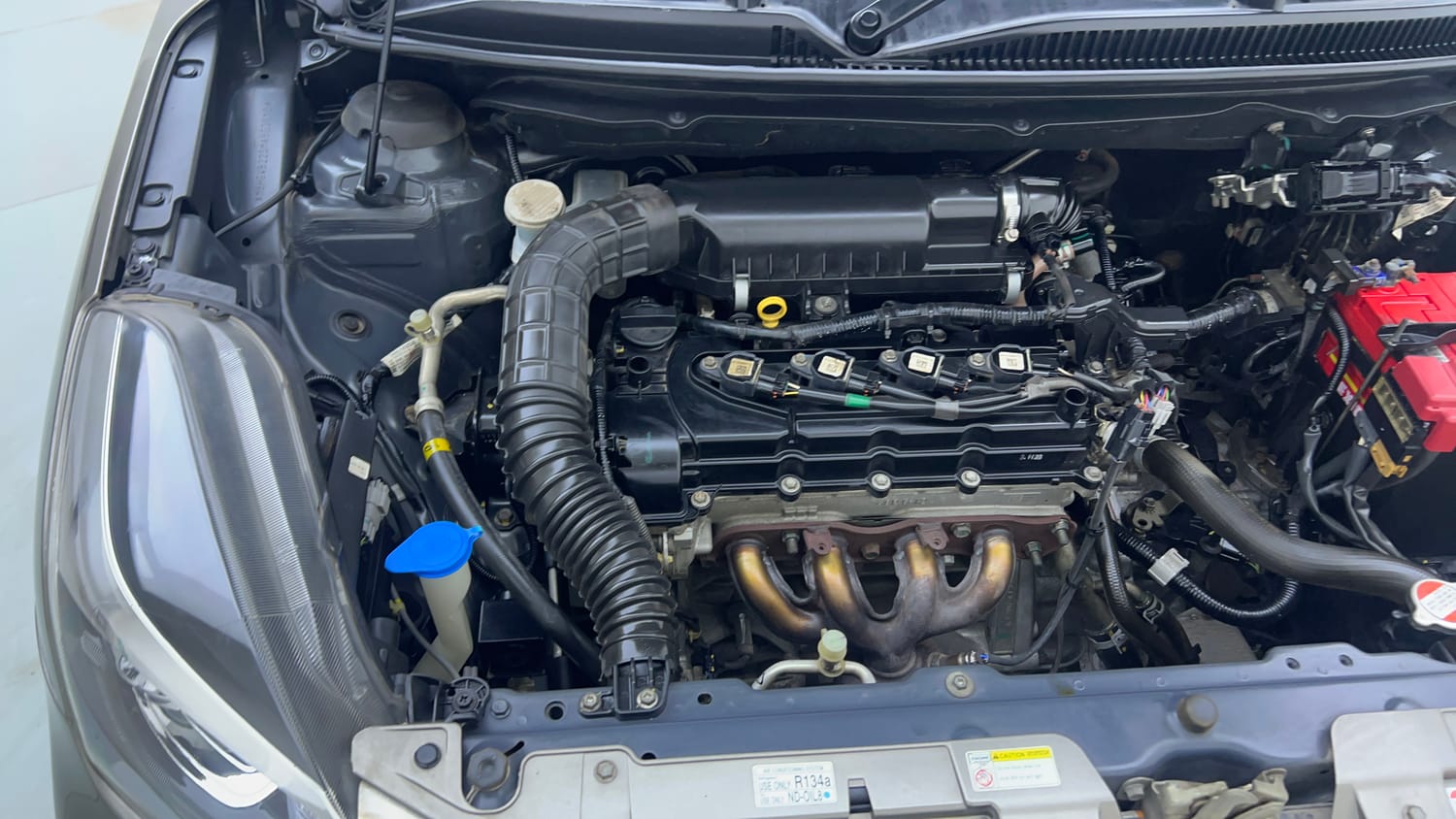 Used 2021 Toyota Glanza V CVT Petrol Automatic engine ENGINE RIGHT SIDE VIEW