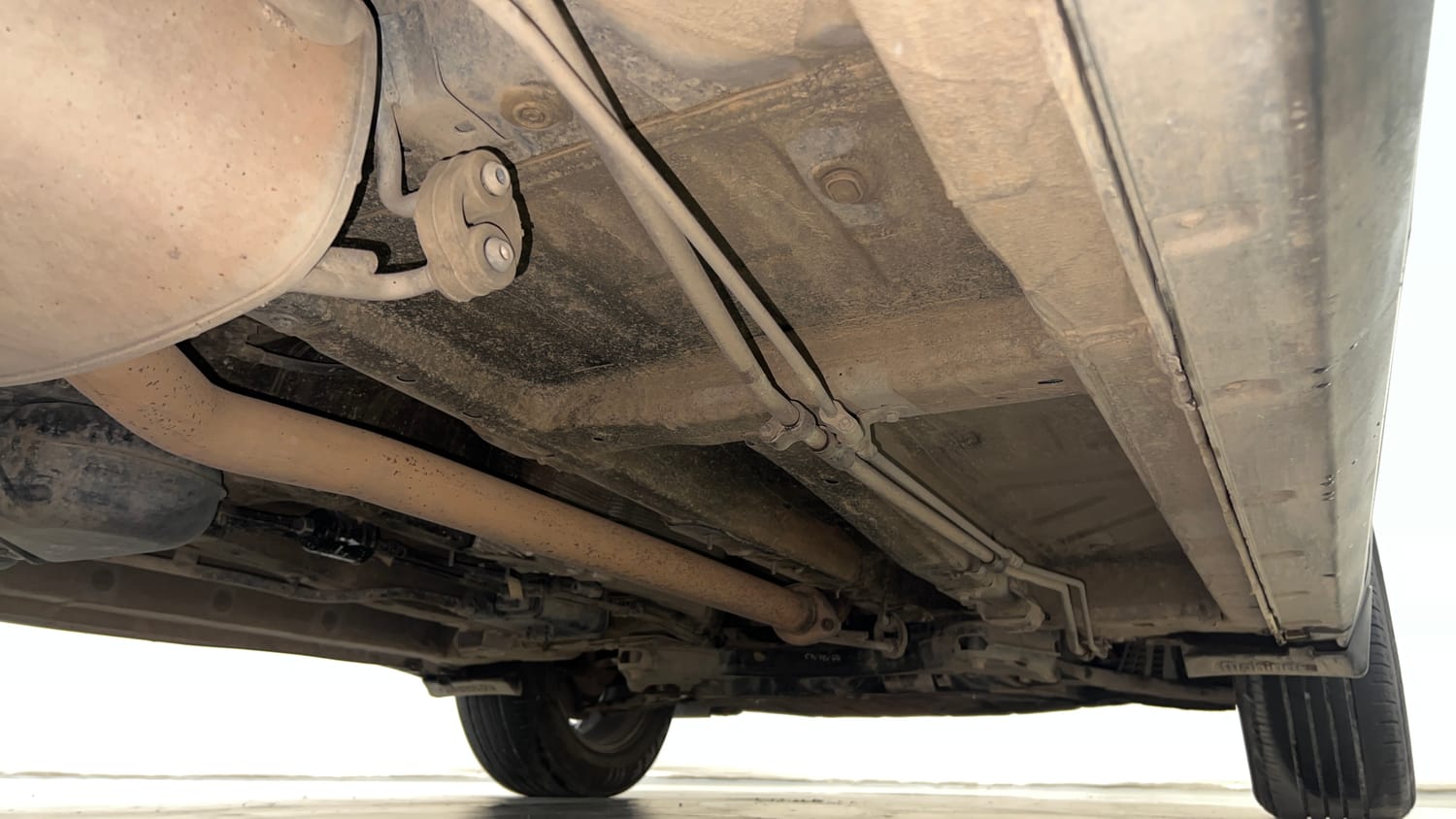 Used 2024 Mahindra XUV700 AX 7 Petrol AT 7 STR Petrol Automatic extra REAR RIGHT UNDERBODY VIEW