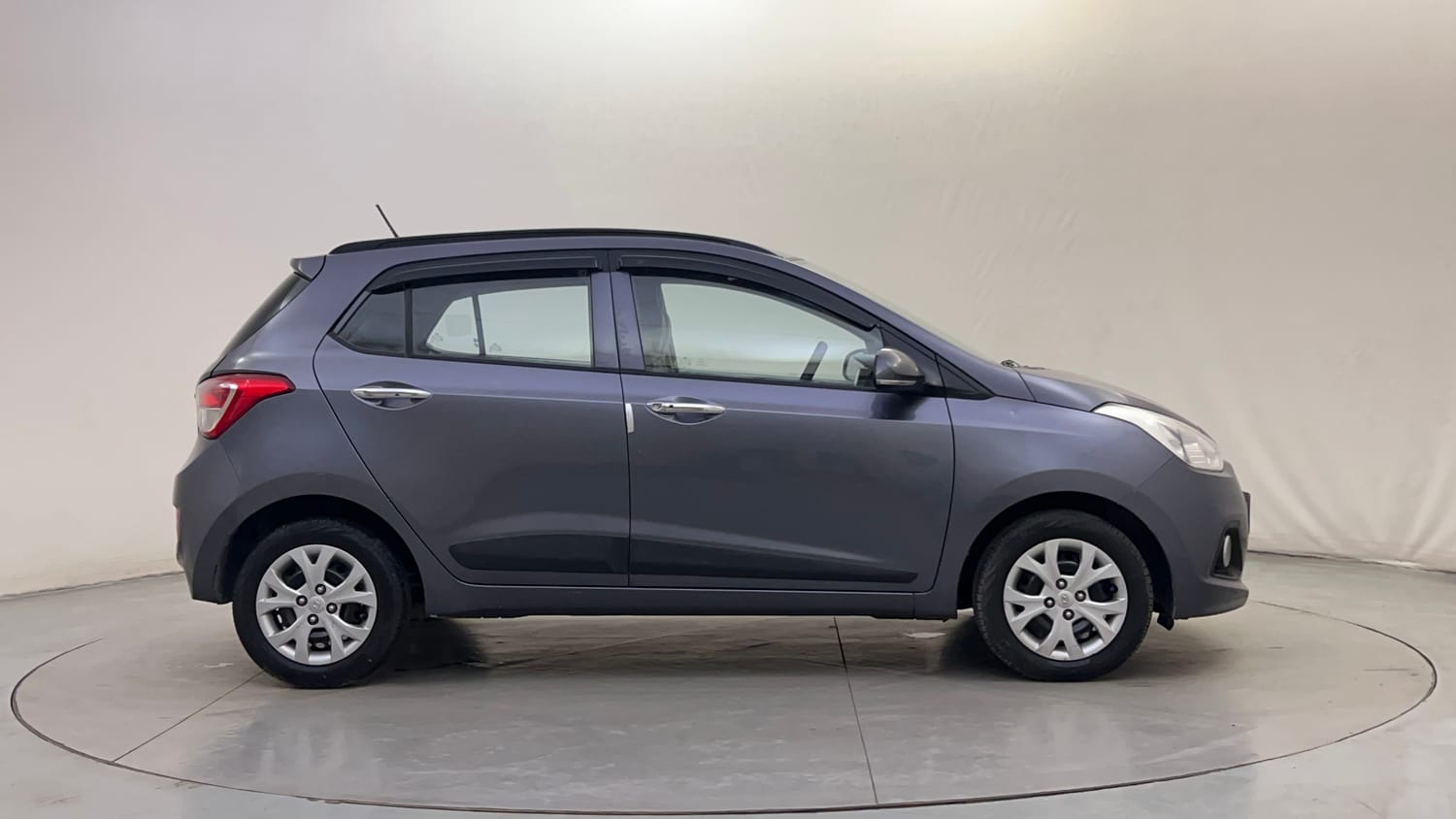 Used 2014 Hyundai Grand i10 Sportz 1.2 Kappa VTVT Petrol Manual exterior RIGHT SIDE VIEW