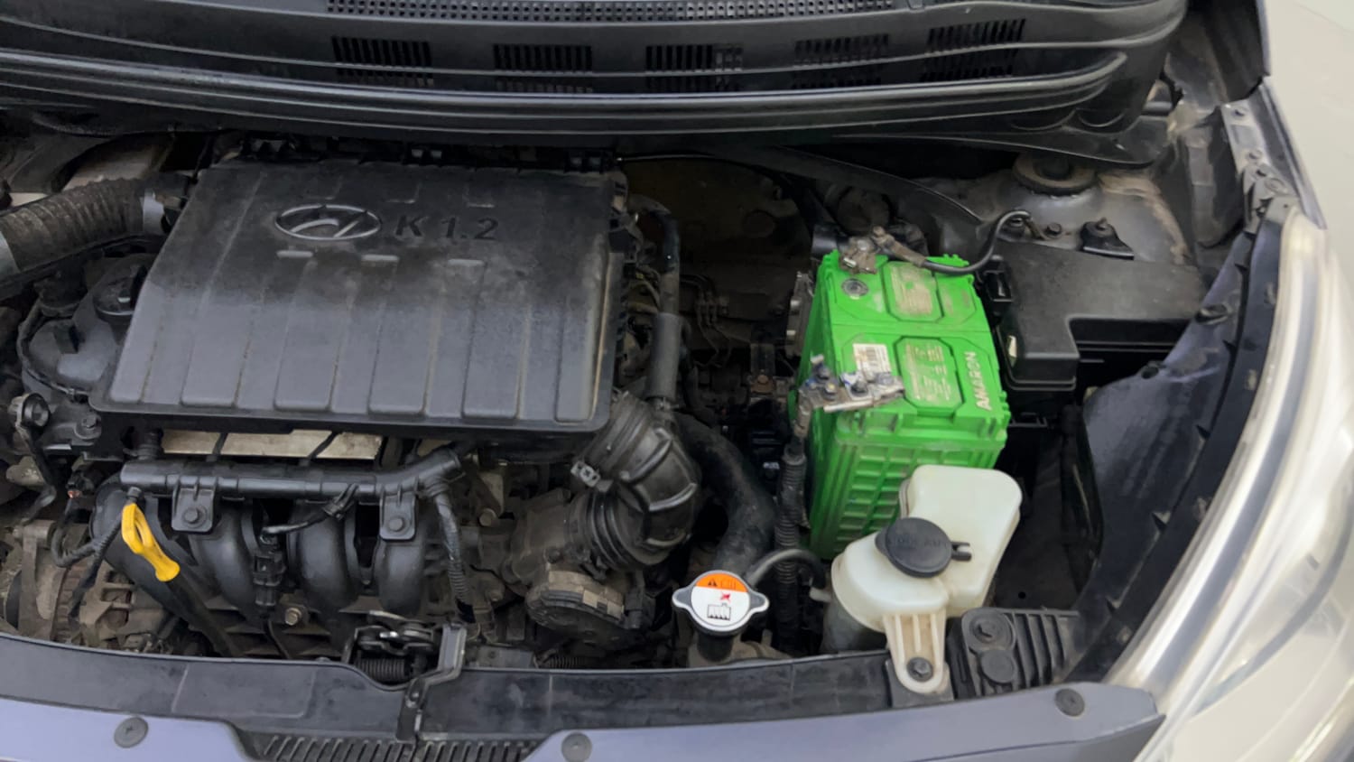 Used 2014 Hyundai Grand i10 Sportz 1.2 Kappa VTVT Petrol Manual engine ENGINE LEFT SIDE VIEW