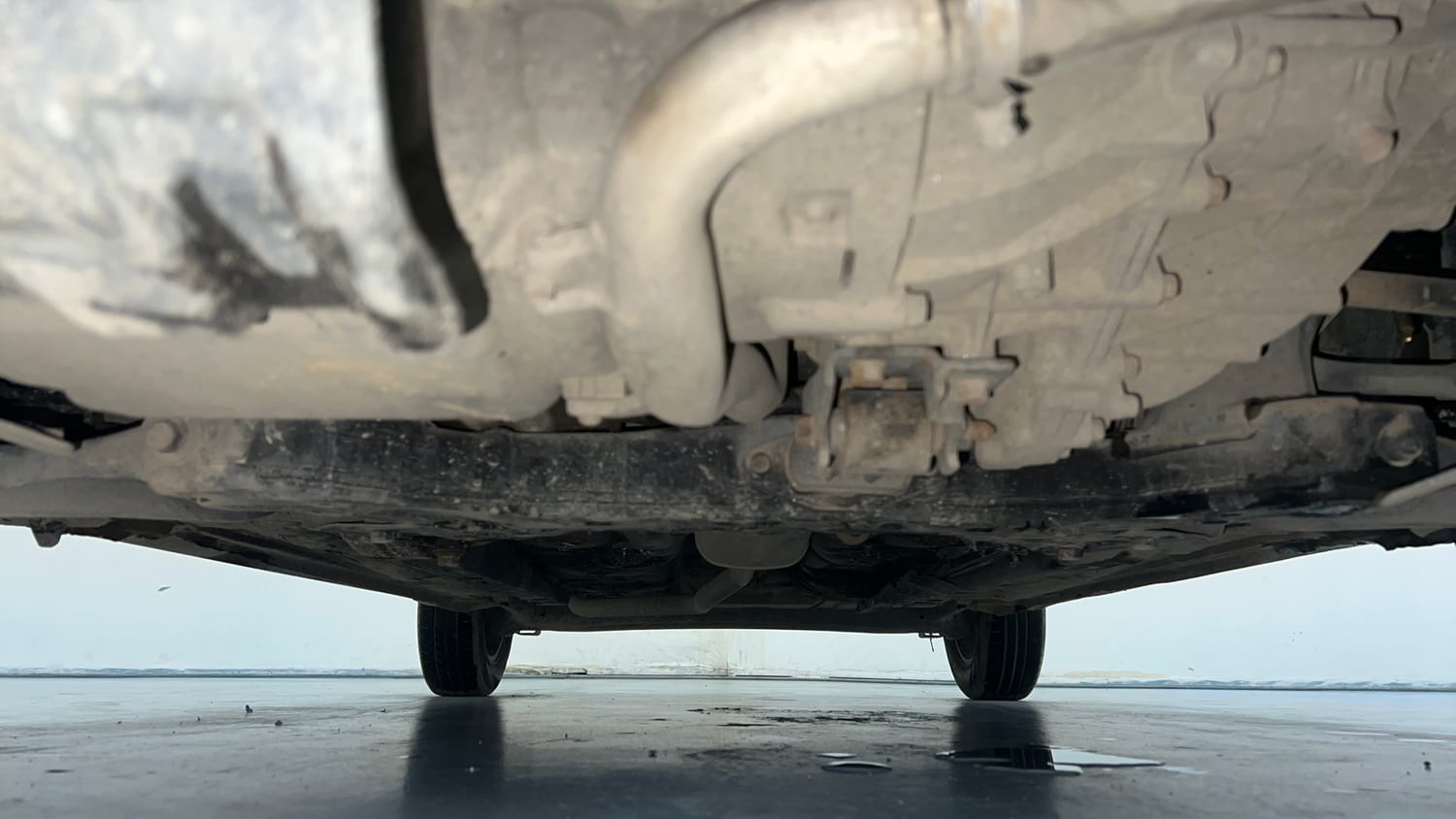 Used 2018 Hyundai Grand i10 Asta U2 1.2 CRDi Diesel Manual extra FRONT LEFT UNDERBODY VIEW