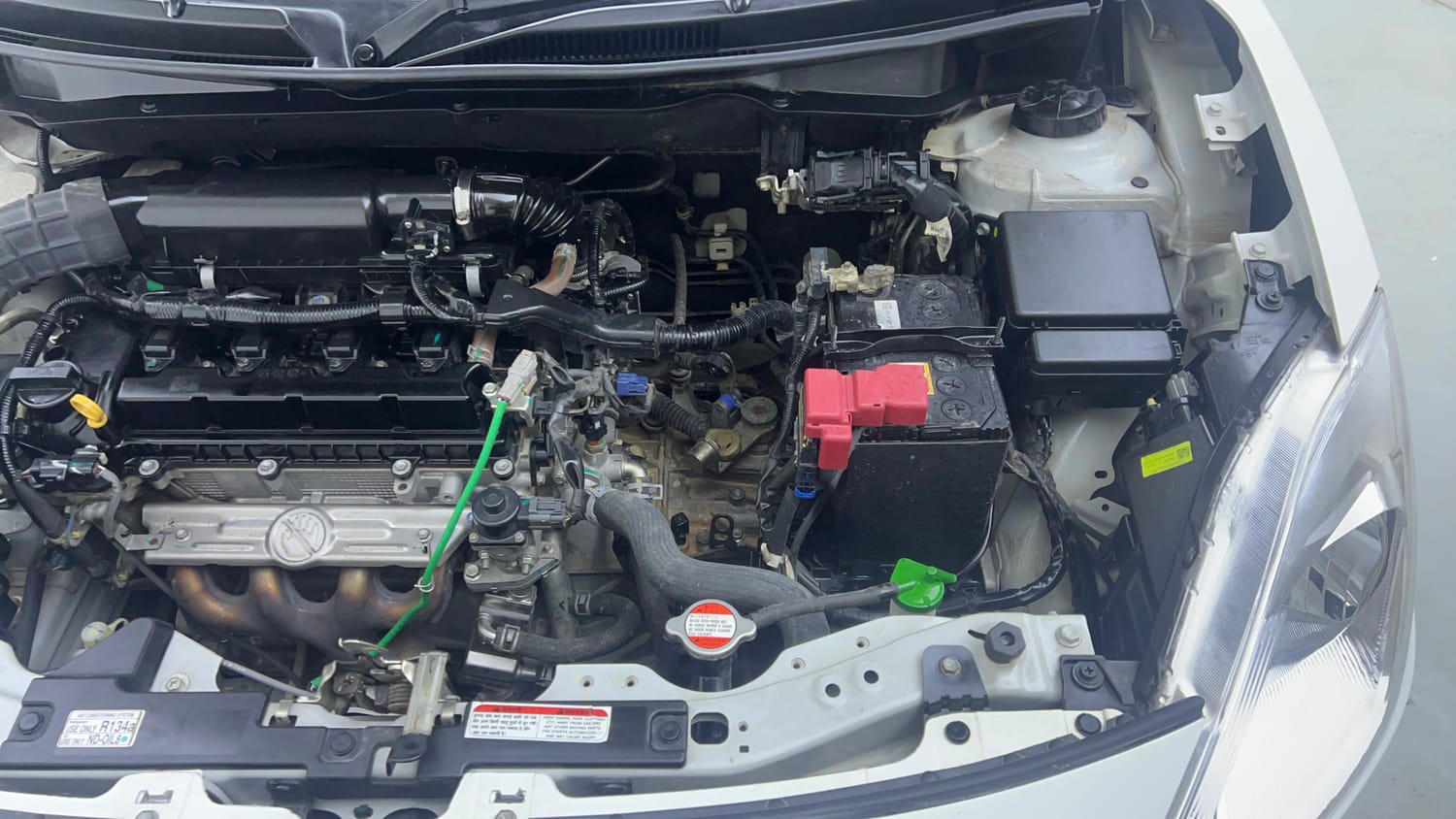 Used 2022 Maruti Suzuki Swift VXi Petrol Manual engine ENGINE LEFT SIDE VIEW