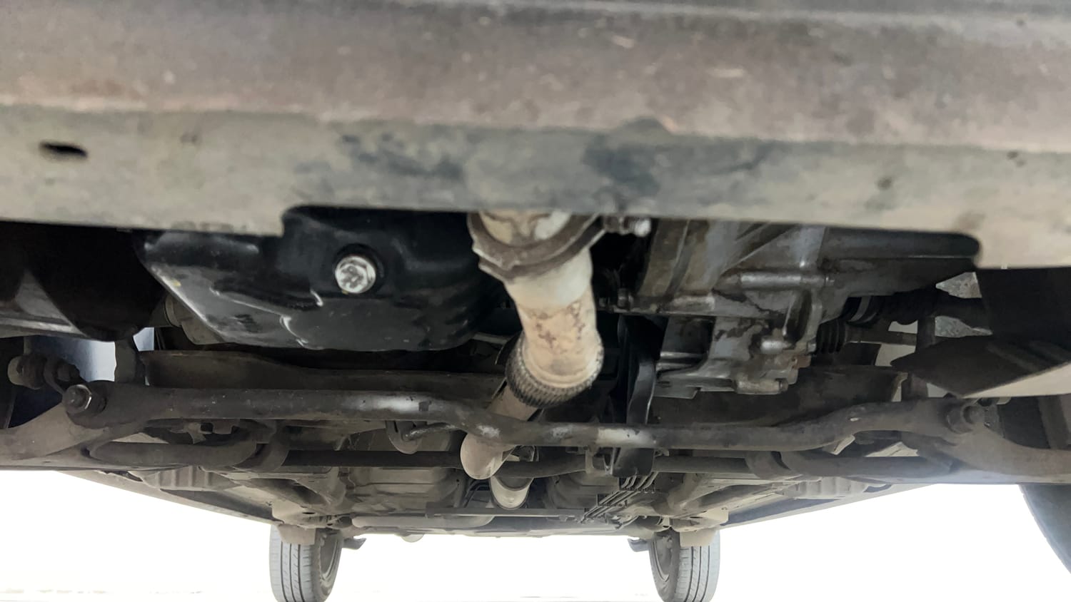 Used 2016 Tata Tiago Revotron XZ Petrol Manual extra FRONT LEFT UNDERBODY VIEW