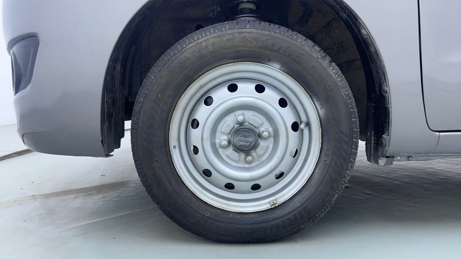 Used 2014 Maruti Suzuki Wagon R LXI Petrol Manual tyres LEFT FRONT TYRE RIM VIEW
