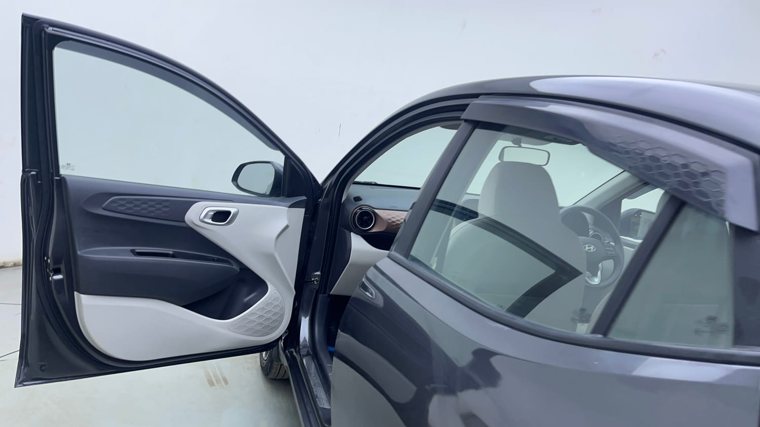 Used 2026 Hyundai Aura SX Plus 1.2 AMT Petrol Petrol Automatic interior LEFT FRONT DOOR OPEN VIEW