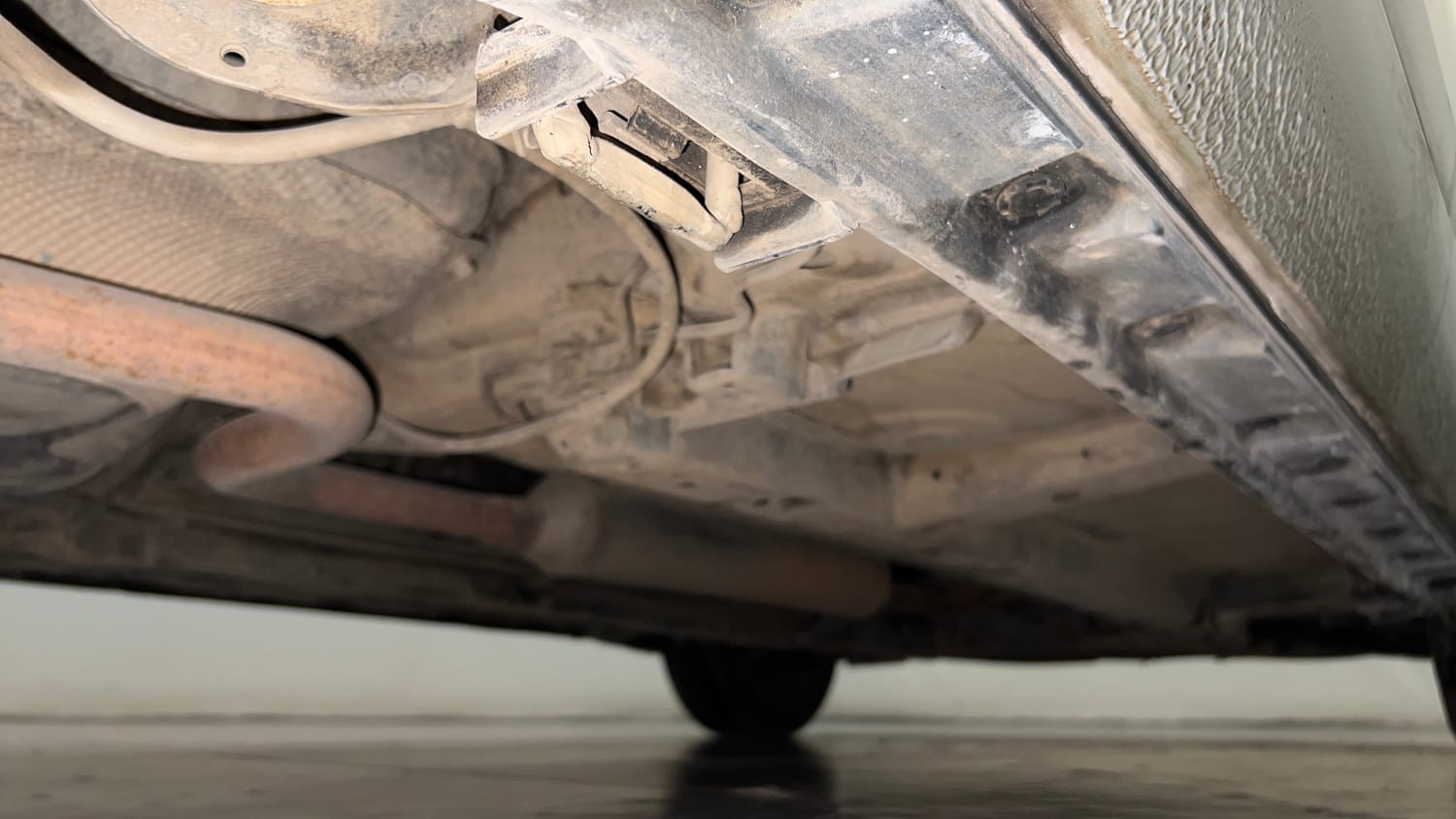 Used 2012 Maruti Suzuki Swift Dzire VXI Petrol Manual extra REAR RIGHT UNDERBODY VIEW