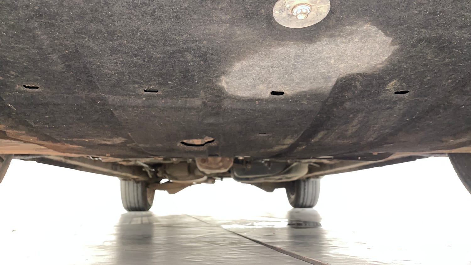 Used 2024 Mahindra XUV700 AX7 Luxury Pack Diesel MT 7 STR Diesel Manual extra FRONT LEFT UNDERBODY VIEW