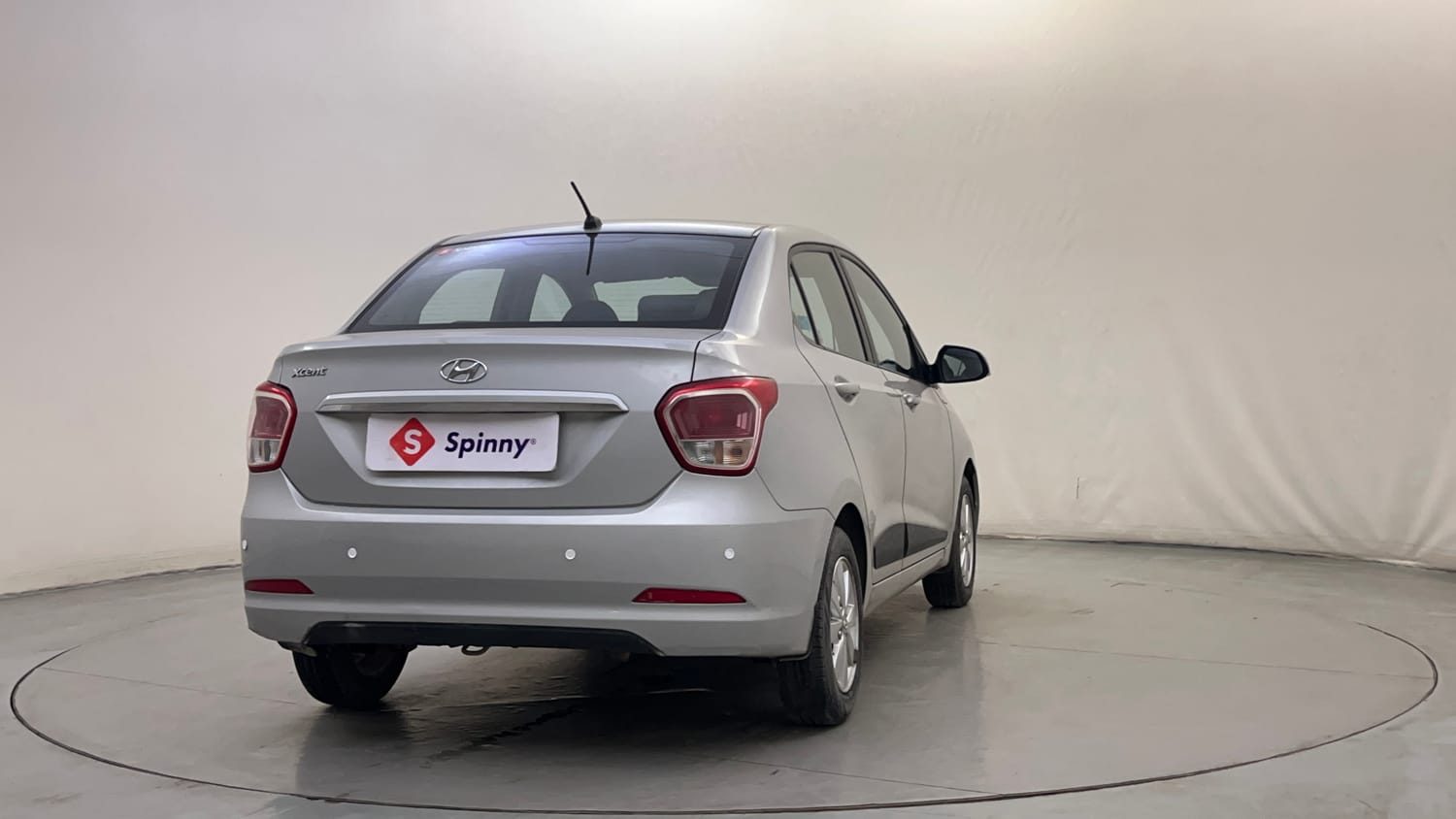 Used 2014 Hyundai Xcent SX AT 1.2 (O) Petrol Automatic exterior RIGHT REAR CORNER VIEW