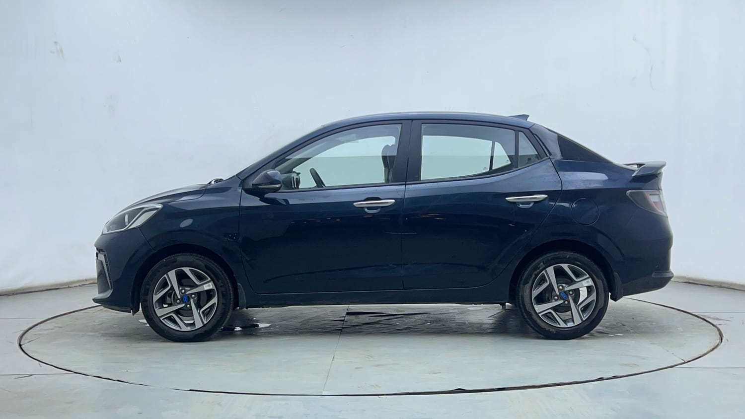 Used 2025 Hyundai Aura SX Plus 1.2 AMT Petrol Petrol Automatic exterior LEFT SIDE VIEW