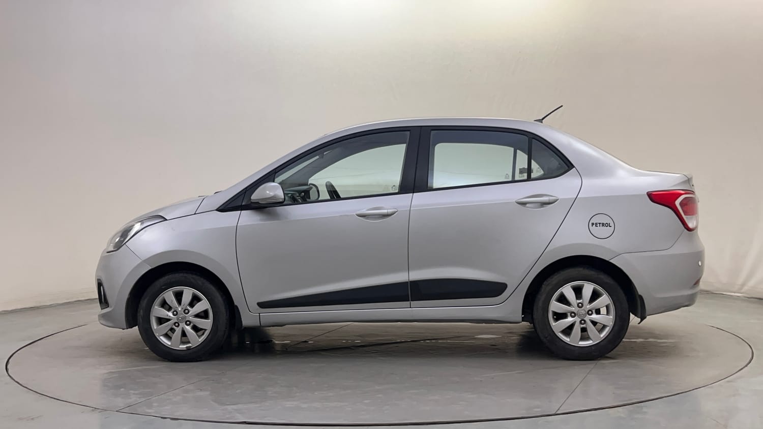 Used 2014 Hyundai Xcent SX AT 1.2 (O) Petrol Automatic exterior LEFT SIDE VIEW