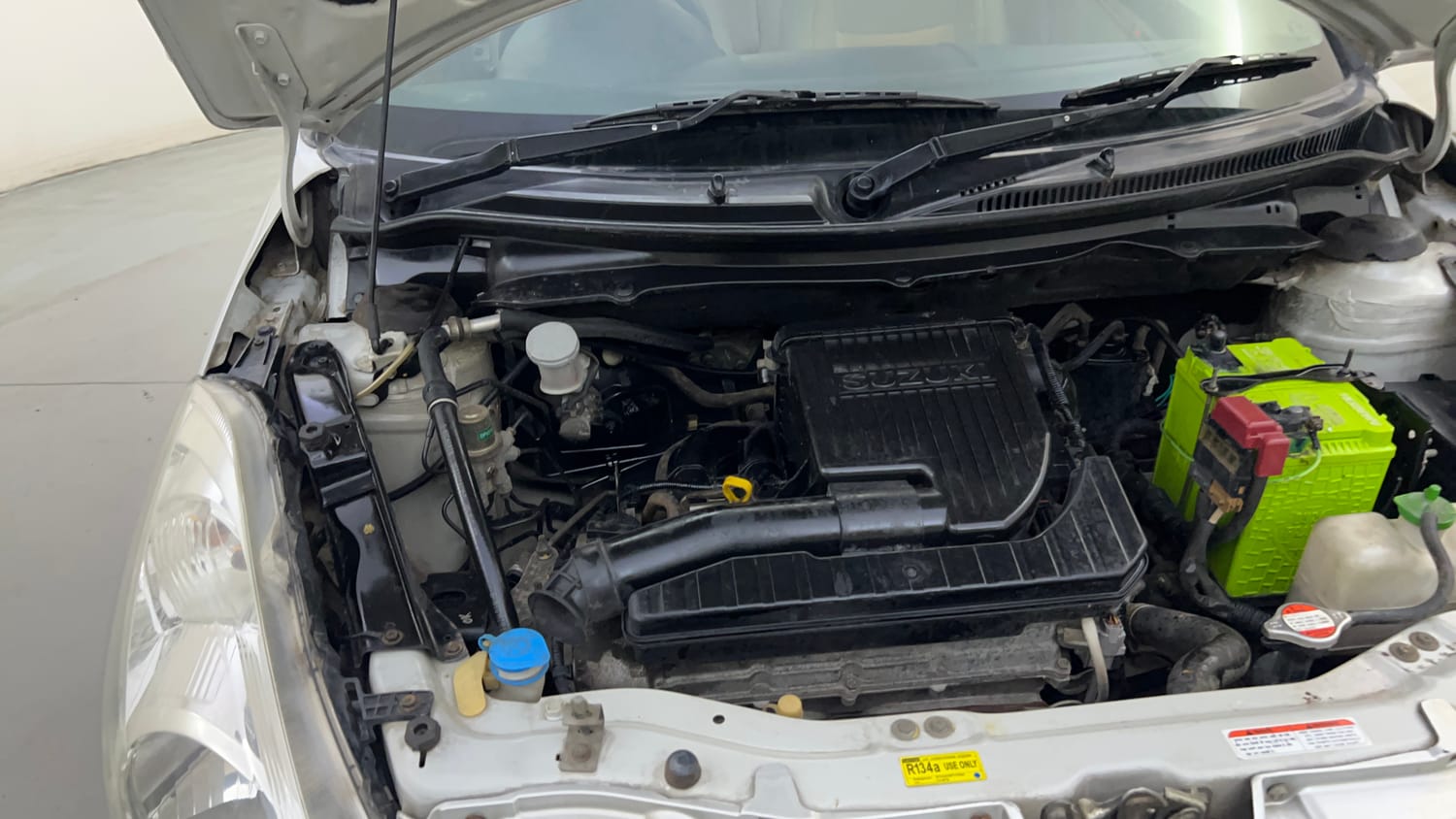 Used 2012 Maruti Suzuki Swift Dzire VXI Petrol Manual engine ENGINE RIGHT SIDE HINGE & APRON VIEW