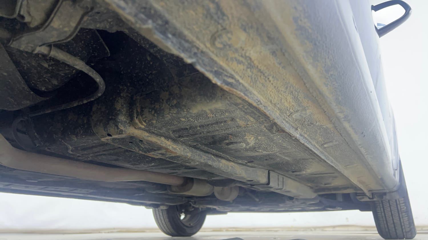 Used 2025 Hyundai Aura SX Plus 1.2 AMT Petrol Petrol Automatic extra REAR RIGHT UNDERBODY VIEW