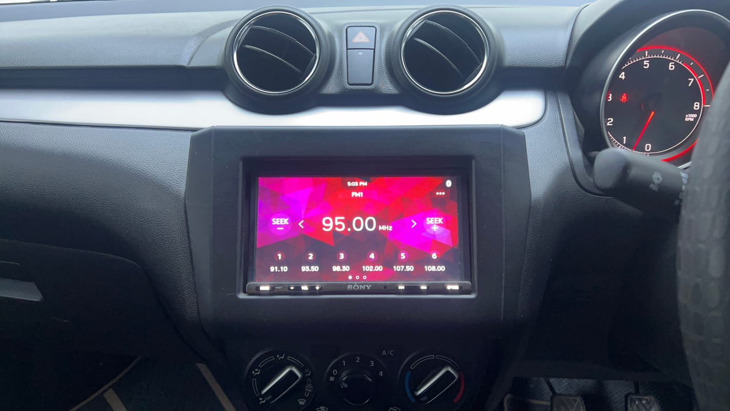 Used 2022 Maruti Suzuki Swift VXi Petrol Manual interior MUSIC SYSTEM & AC CONTROL VIEW