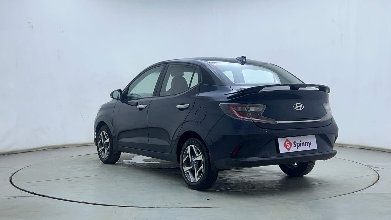 Used 2025 Hyundai Aura SX Plus 1.2 AMT Petrol Petrol Automatic exterior LEFT REAR CORNER VIEW