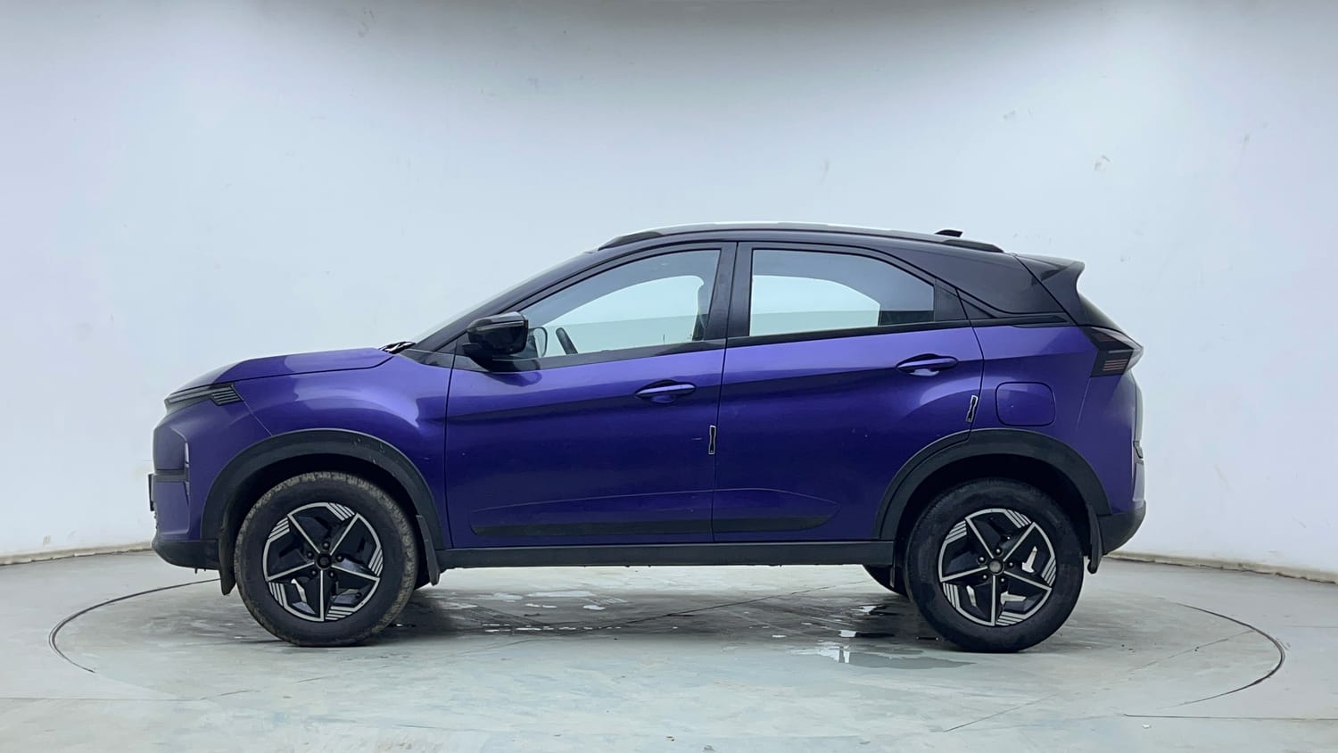 Used 2024 Tata Nexon Fearless Plus S Purple 1.2 Revotron Petrol 7DCA Dual Tone Petrol Automatic exterior LEFT SIDE VIEW