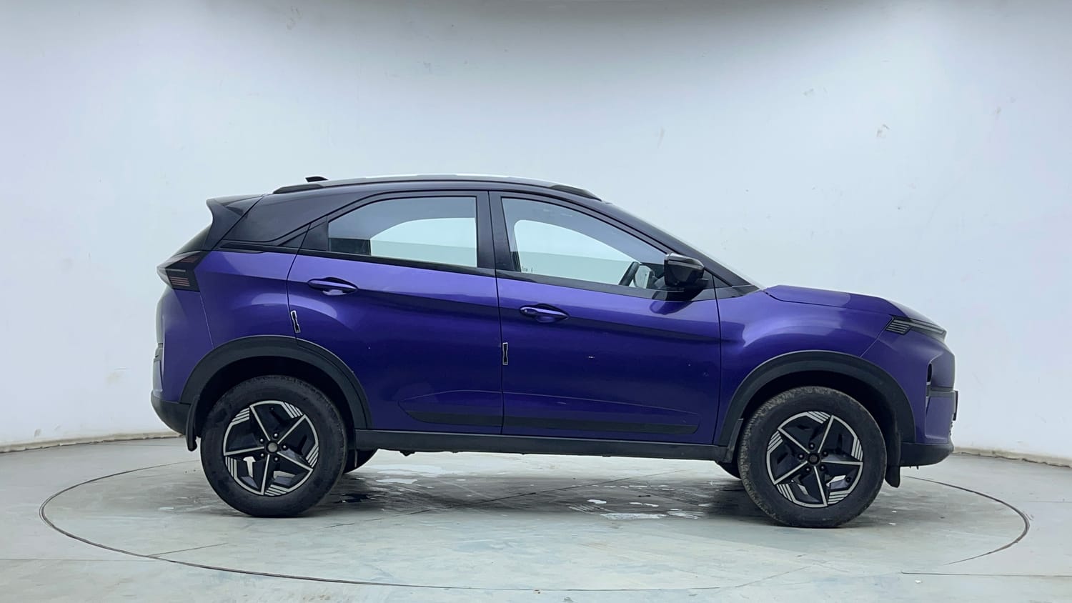Used 2024 Tata Nexon Fearless Plus S Purple 1.2 Revotron Petrol 7DCA Dual Tone Petrol Automatic exterior RIGHT SIDE VIEW