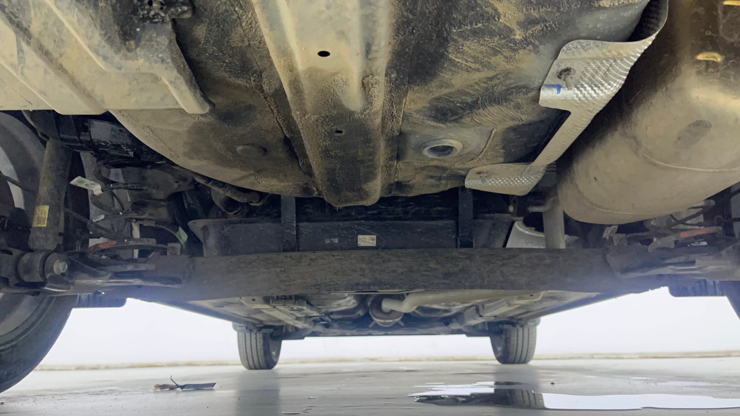 Used 2026 Hyundai Aura SX Plus 1.2 AMT Petrol Petrol Automatic extra REAR UNDERBODY VIEW (TAKEN FROM REAR)