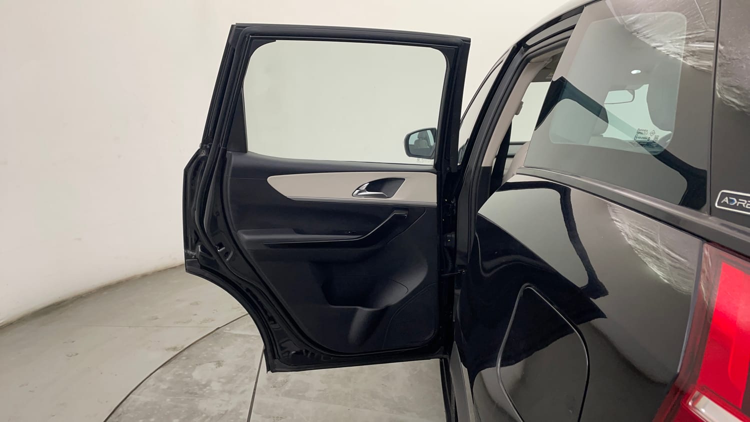 Used 2024 Mahindra XUV700 AX7 Luxury Pack Diesel MT 7 STR Diesel Manual interior LEFT REAR DOOR OPEN VIEW