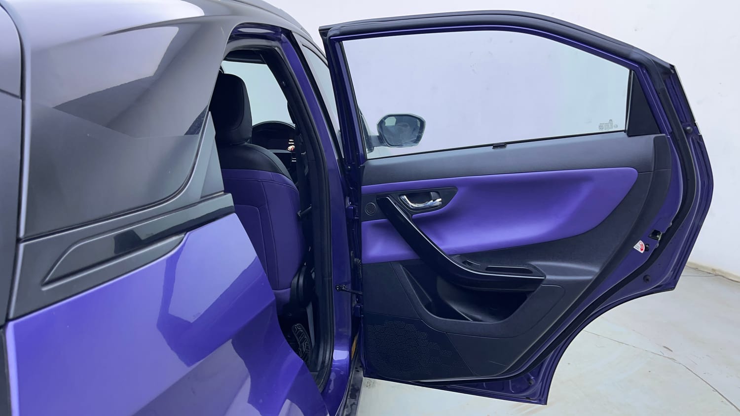 Used 2024 Tata Nexon Fearless Plus S Purple 1.2 Revotron Petrol 7DCA Dual Tone Petrol Automatic interior RIGHT REAR DOOR OPEN VIEW