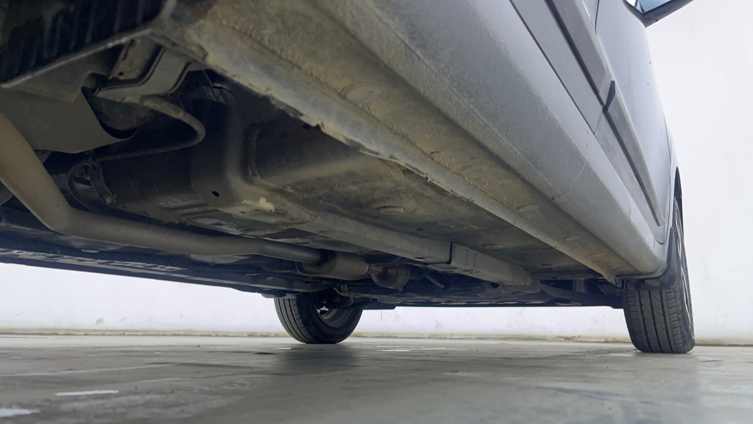 Used 2026 Hyundai Aura SX Plus 1.2 AMT Petrol Petrol Automatic extra REAR RIGHT UNDERBODY VIEW