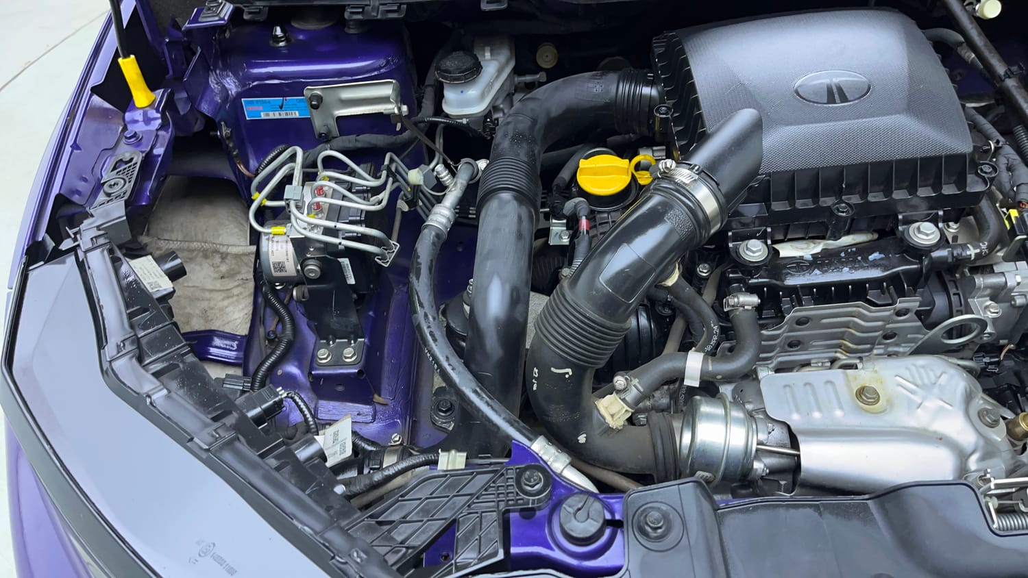 Used 2024 Tata Nexon Fearless Plus S Purple 1.2 Revotron Petrol 7DCA Dual Tone Petrol Automatic engine ENGINE RIGHT SIDE VIEW