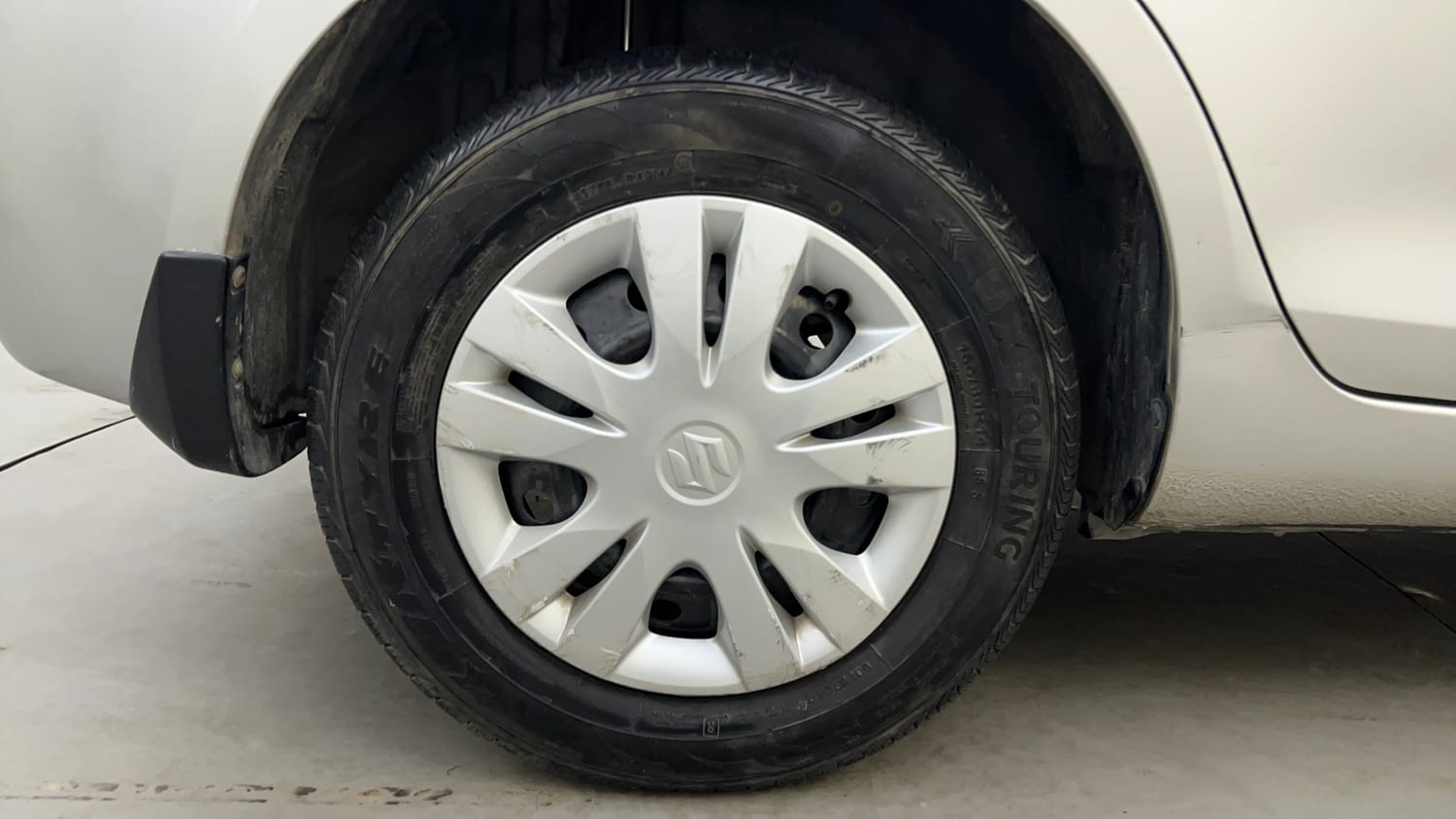 Used 2012 Maruti Suzuki Swift Dzire VXI Petrol Manual tyres RIGHT REAR TYRE RIM VIEW