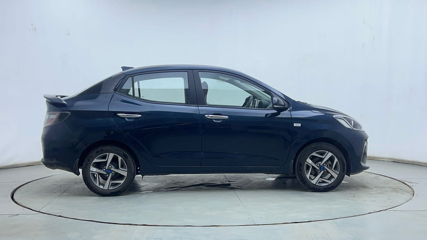 Used 2025 Hyundai Aura SX Plus 1.2 AMT Petrol Petrol Automatic exterior RIGHT SIDE VIEW